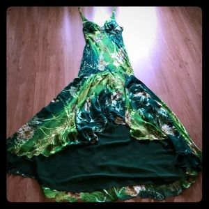 Green evening gown needing TLC.